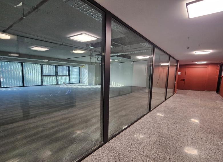 Office interior with glass partitions
